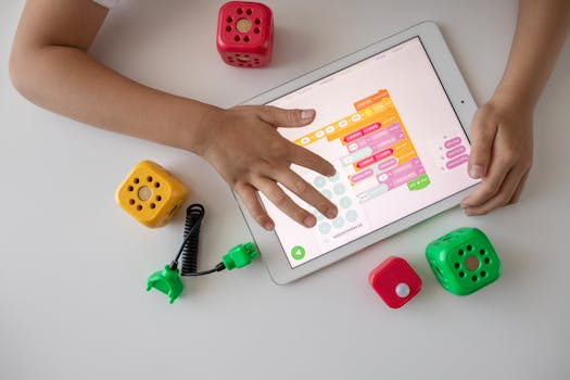 タブレットで遊ぶ子ども